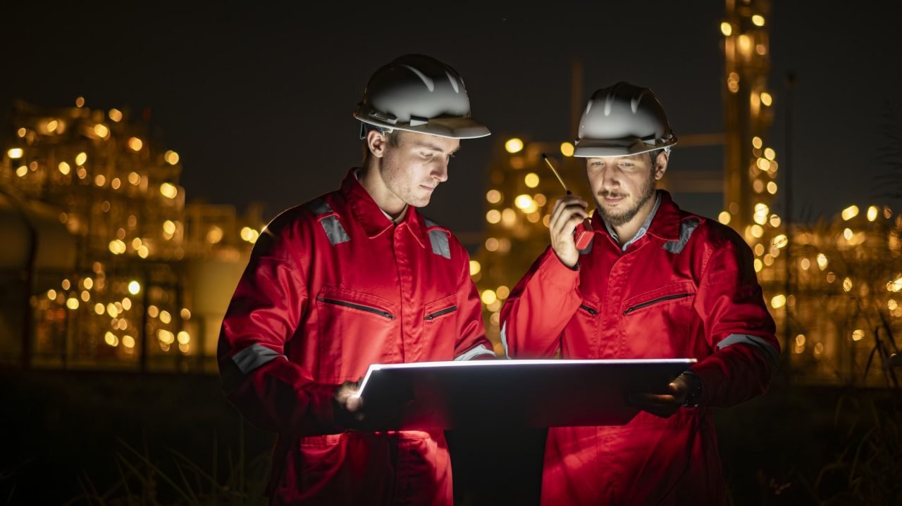 Fire safety engineers reviewing building plans on site